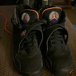 Black and orange air Jordans